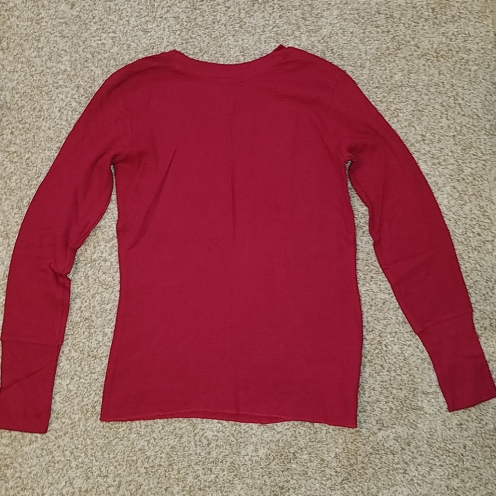 Long sleeve red shirt.